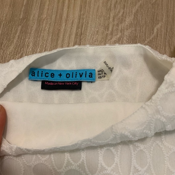 NWOT Alice + Olivia cream rolled sleeve silk top. - Picture 6 of 6